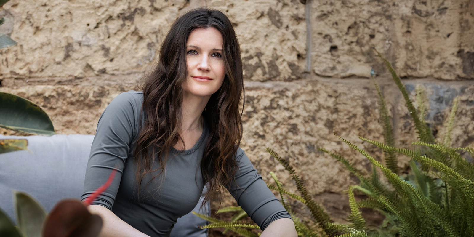 Julia Milner, founder of Theia Moon, wearing the brand’s signature 3/4 sleeve top