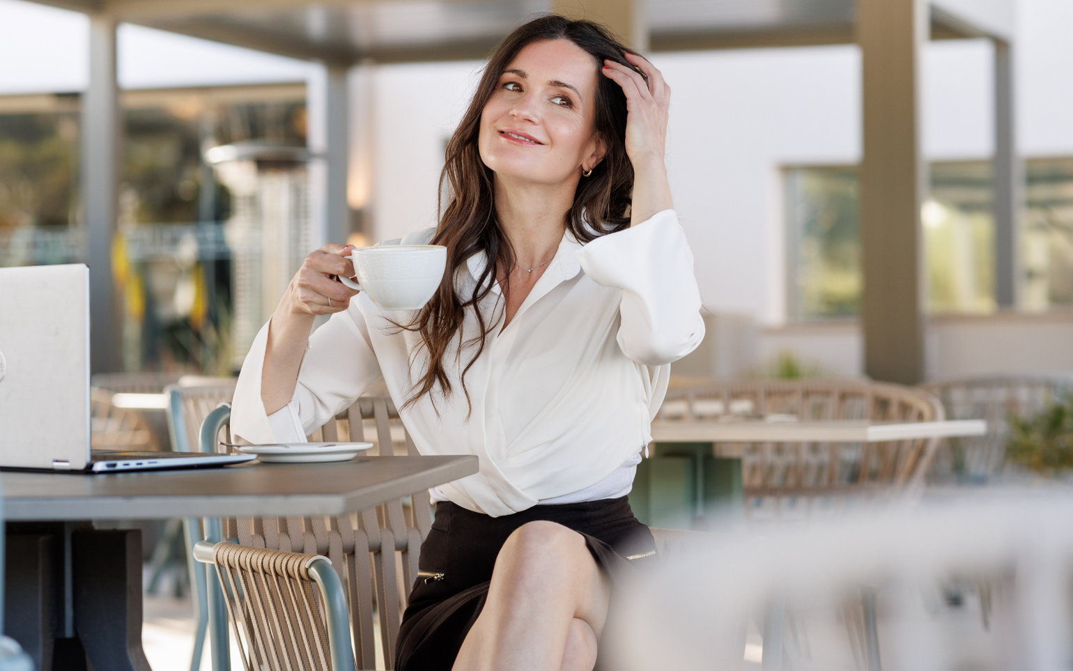 Portrait of Julia Milner, founder of Theia Moon, a brand of elegant activewear clothing